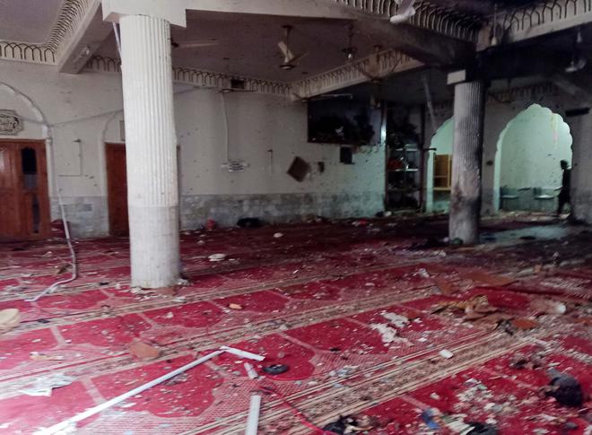 A general view of the prayer hall after a bomb blast inside a mosque during Friday prayers in Peshawar, Pakistan on March 4, 2022 | Photo Credit: Reuters