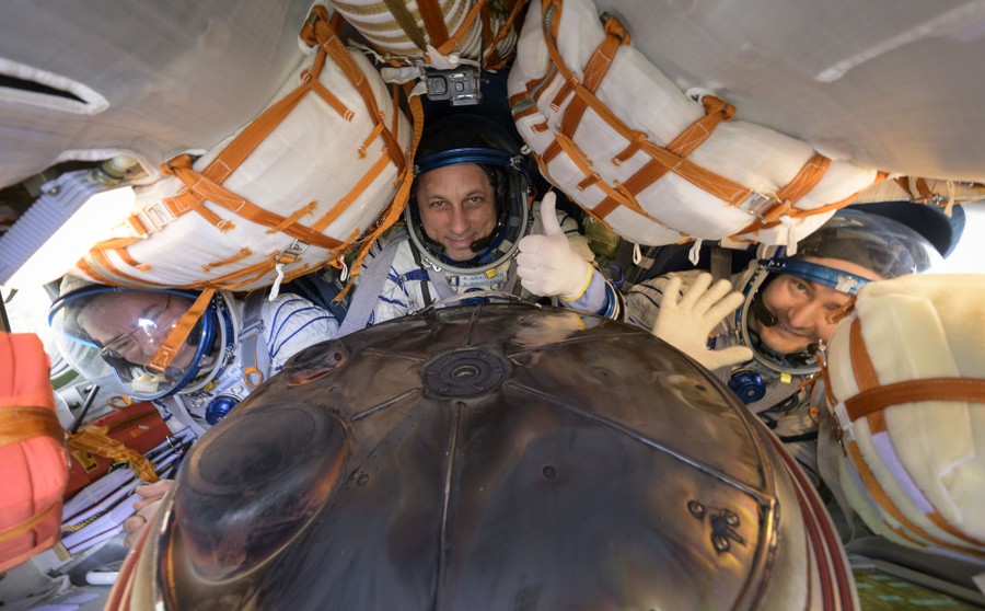 International Space Station Expedition 66 crew members (from left) Mark Vande Hei of NASA, and cosmonauts Anton Shkaplerov and Pyotr Dubrov of Roscosmos, are seen inside their Soyuz MS-19 spacecraft after it landed in a remote area near the town of Zhezkazgan, Kazakhstan, on March 30, 2022. Vande Hei and Dubrov returned to Earth after logging 355 days in space. Vande Hei's mission is the longest single spaceflight by a U.S. astronaut in history. # Bill Ingalls / NASA / Getty