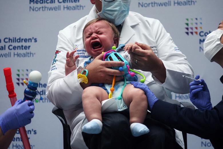He doesn't want it. Oliver Harris, 9 months, cries after receiving a vaccine against the coronavirus at Northwell Health's Cohen Children's Medical Center in New Hyde Park, New York, June 22. REUTERS/Shannon Stapleton
