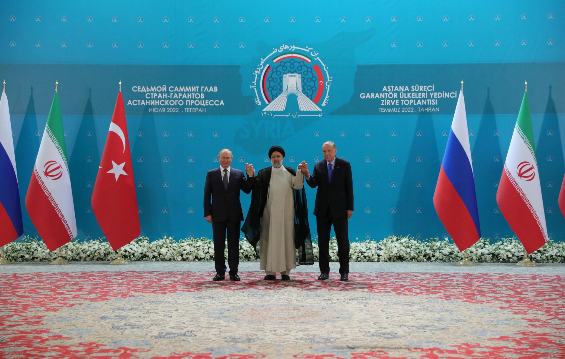 Putin with the Iranian and Turkish leaders