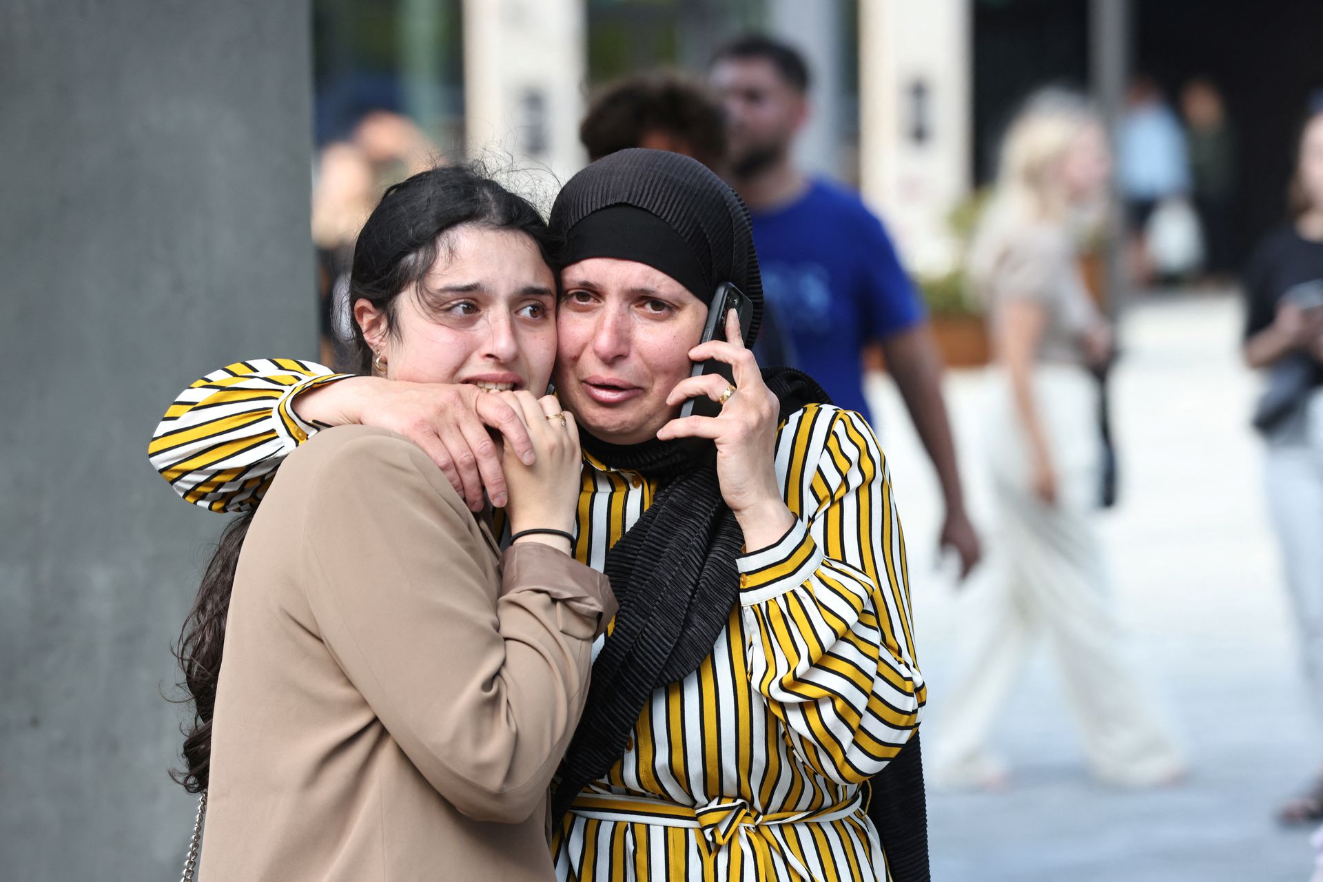 People react outside Field's shopping centre, after Danish police said they received reports of shooting, in Copenhagen, Denmark, July 3, 2022. Ritzau Scanpix/Olafur Steinar Gestsson via REUTERS
