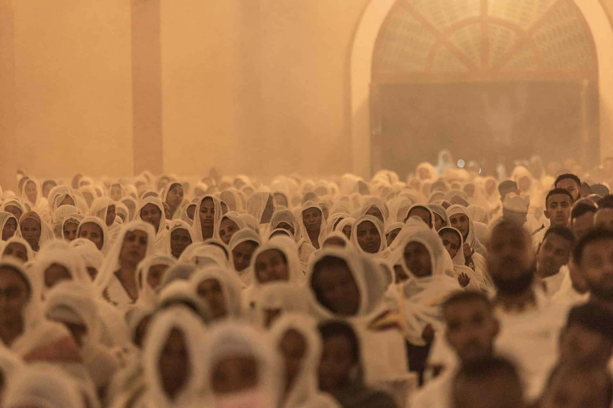 Addis Ababa, Ethiopia Ethiopian Orthodox devotees pray during the celebration of Easter at Bole Medhanialem church in Addis Ababa. Ethiopian Easter, also known as Fasika in Amharic, commemorates Jesus’s resurrection and marks the end of a 55-day fast among Orthodox believers Photograph: Amanuel Sileshi/AFP/Getty Images