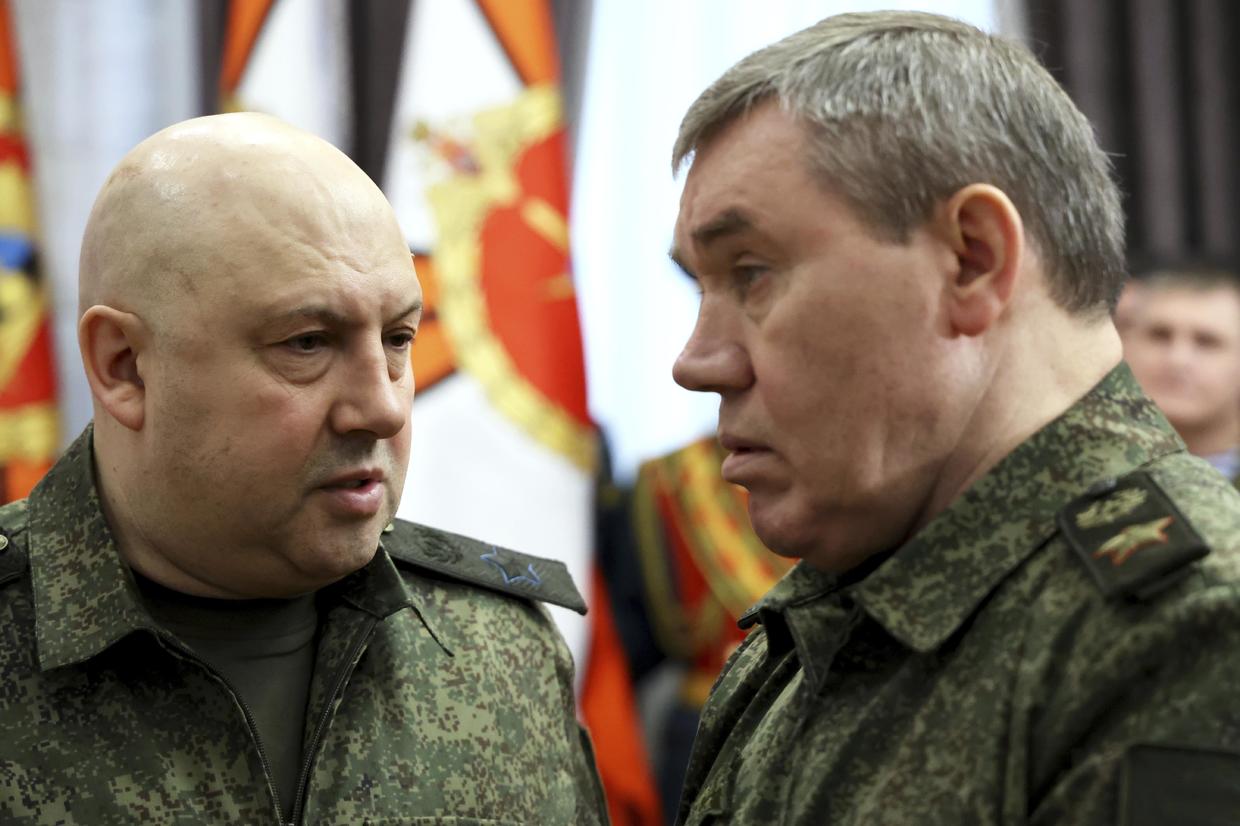 General Sergei Surovikin and Russian General Staff Valery Gerasimov talk during visit of Russian President Vladimir Putin to the Southern Military District, on December 31, 2022.